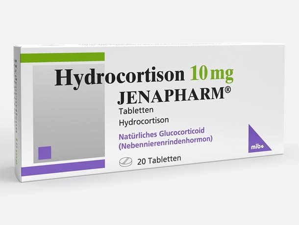 Eine weiße Schachtel Hydrocortison 10 mg JENAPHARM-Tabletten mit deutschem Text sowie violetten und grünen Designelementen; enthält 20 Tabletten.