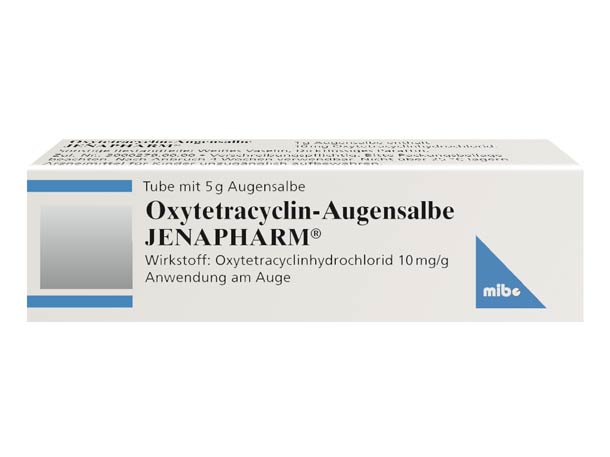 Eine weiße Packung Oxytetracyclin-Augensalbe von JENAPHARM, 5g, mit deutscher Beschriftung und blauen Details.