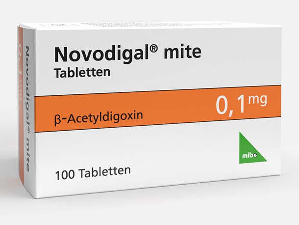 Weiße Schachtel Novodigal mite mit orangen Designelementen, 0,1 mg β-Acetyldigoxin, 100 Tabletten.