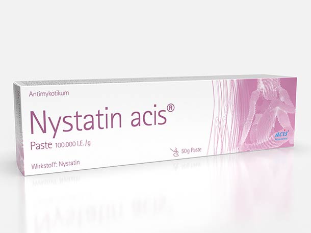 Eine Schachtel Nystatin acis Paste 100.000 I.E./g, Antimykotikum, 50 g, mit der Darstellung einer sitzenden Frau auf weiß-rosa Hintergrund.
