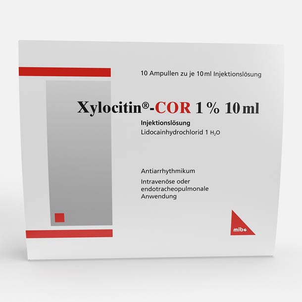 Xylocitin-COR 1% Injektionslösung (10 ml) von mibe in weißer Schachtel mit roten Akzenten.