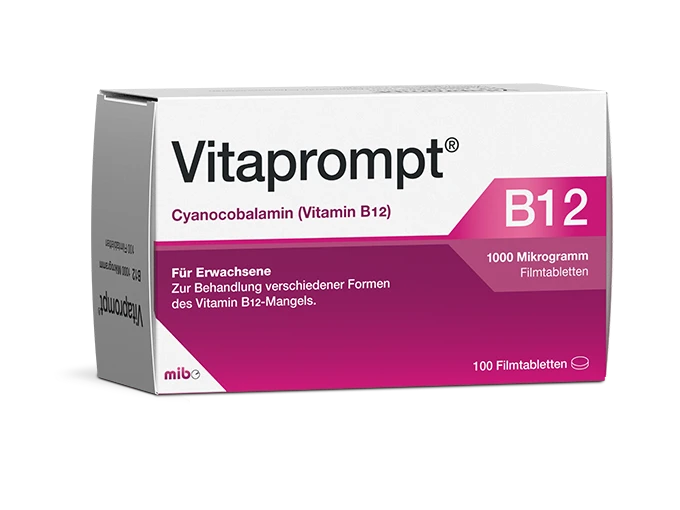 Weiße Schachtel mit Vitaprompt B12 Tabletten für Erwachsene, 100 Filmtabletten, weiß-rosa Design.